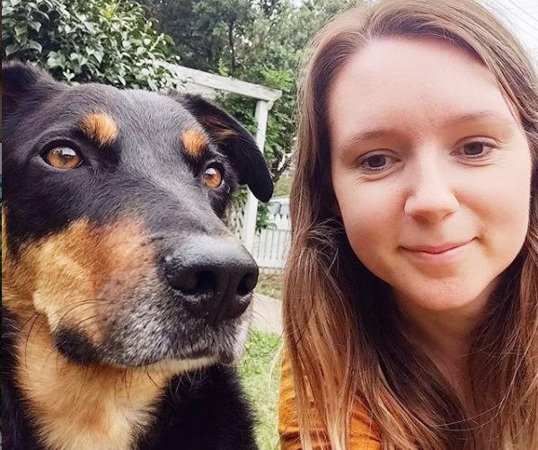 Amanda Krieg and dog, Hunter, pose for a selfie together