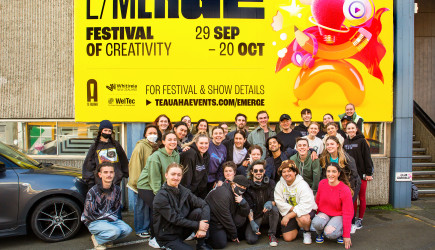 Whitireia and WelTec students with EMERGE billboard