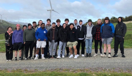 Whitireia and WelTec electrical apprentice grads at a windfarm